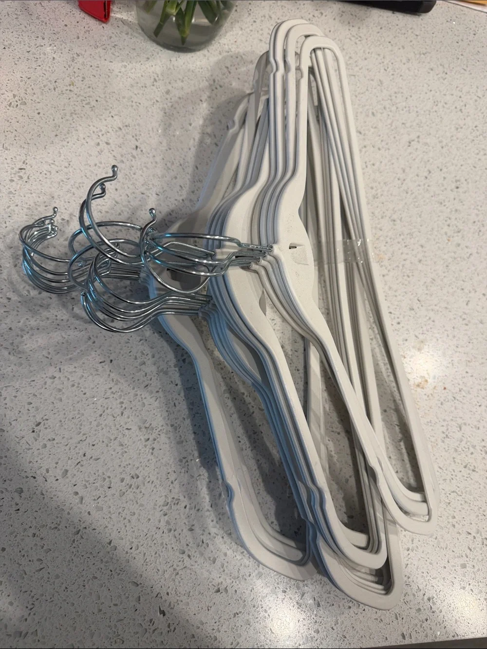 Set of White Plastic & Chrome Metal Hangers